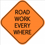 SIgns posted reminding Ozark's motorists of omnipresent improvements