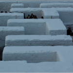 Battlefield Mall patrons navigate a snow maze created by snowplow driver